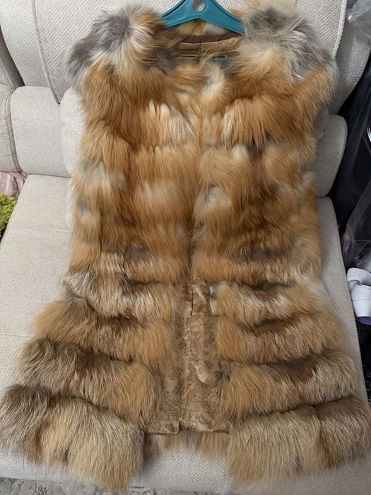 Продам меховую жилетку