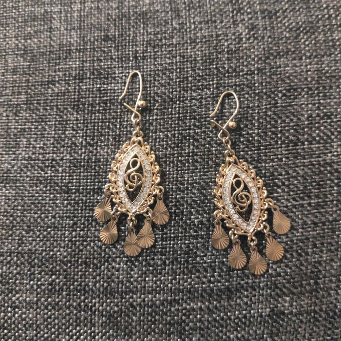 Лого на нота със камъчета