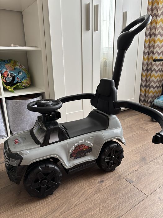 Машинка каталка толокар