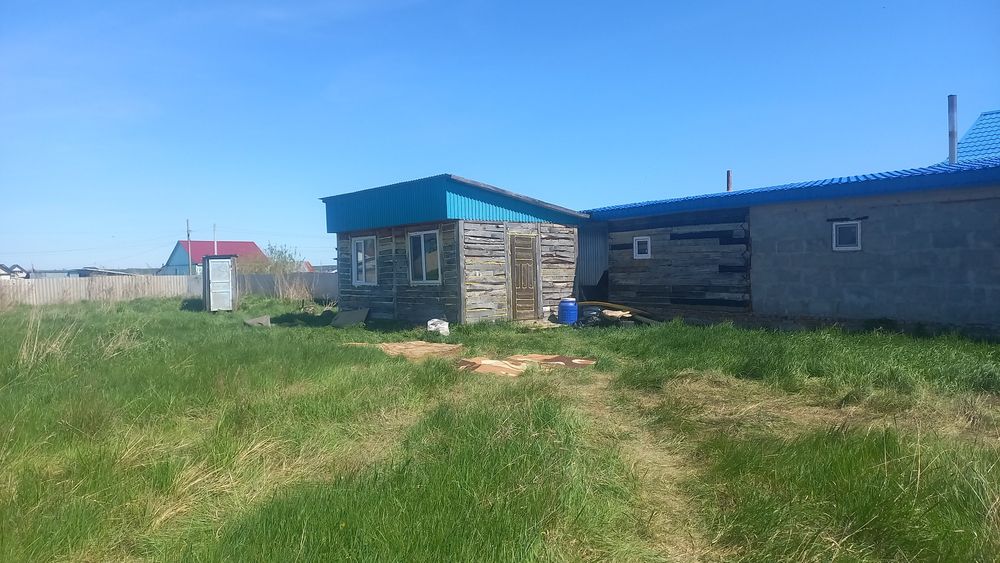 Участок с жилой времянкой