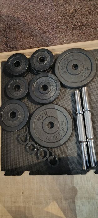 Дъмбели 2x10кг.+2 тежест по 5кг.