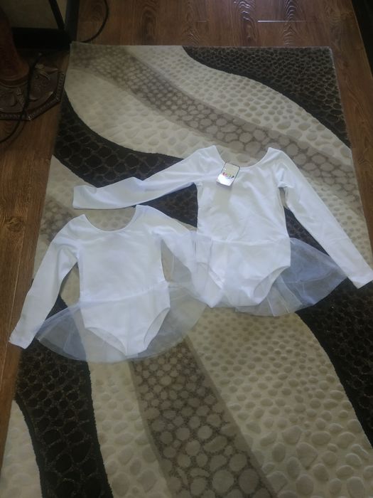 Продам гимнастические купальники на девочек.