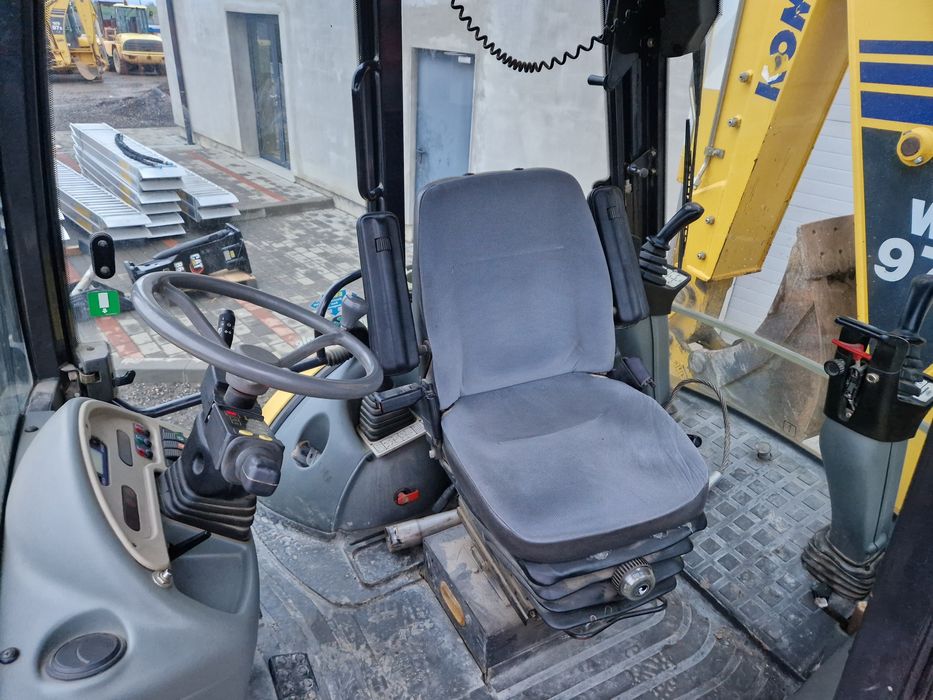 Buldoexcavator  Komatsu 97 S