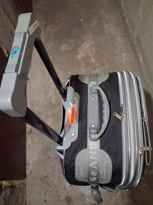 Пътнически куфар с колелца