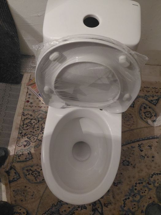 Новый,не использованный унитаз