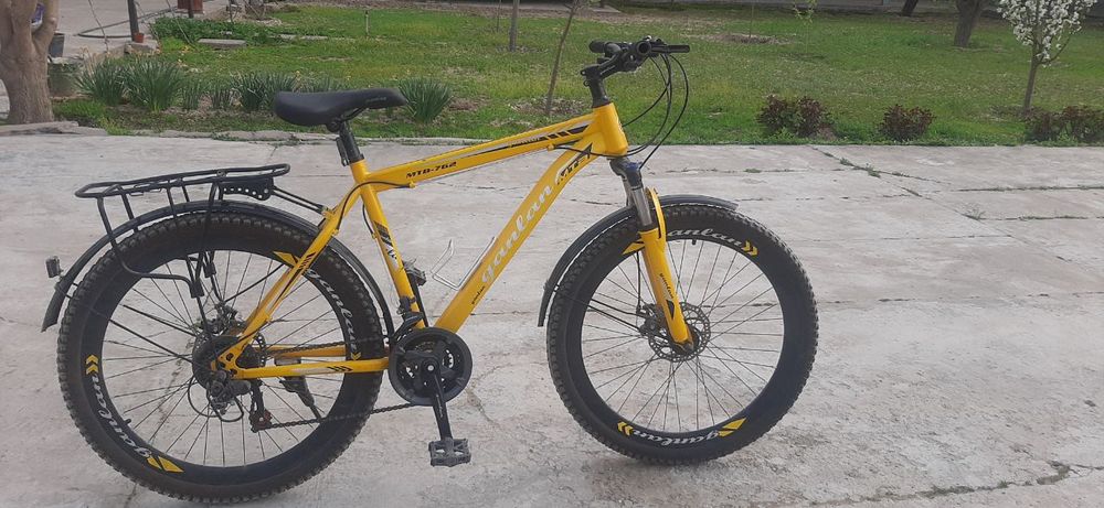 Sariq rangli velosiped