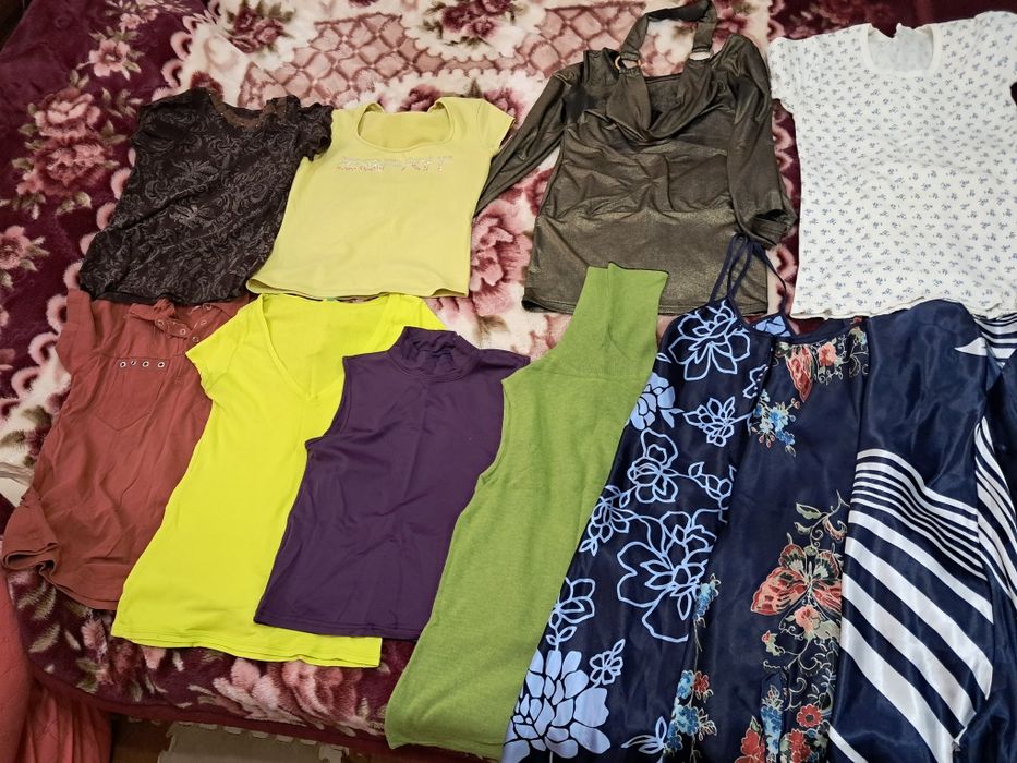 Одежды женские .