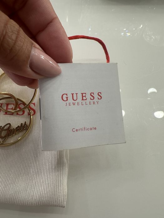 Guess ,една обеца от стомана