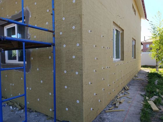 Утеплением сданий домов пенополиуретаном базальтом