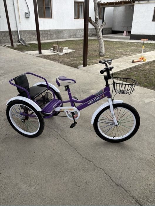 Велосипед трех колесный