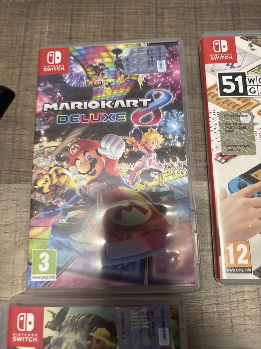 Vand nintendo switch+ accesori si 10 jocuri
