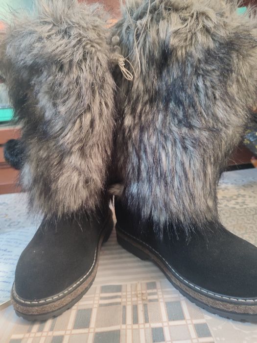 Продам новые  тёплые унты.