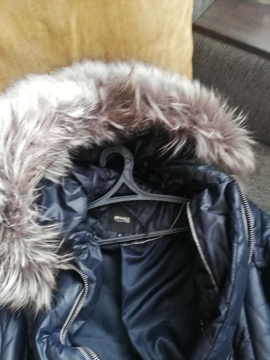 Продаю Женский пуховик.