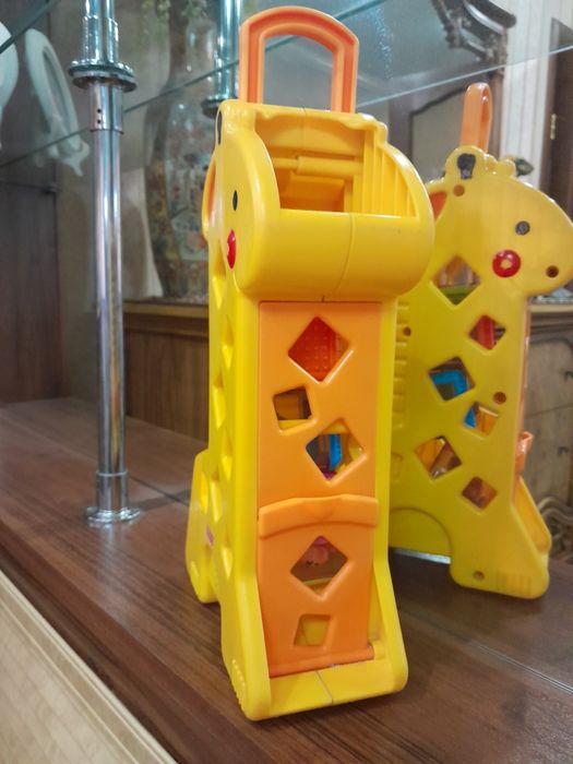 Продам игрушку жирафика