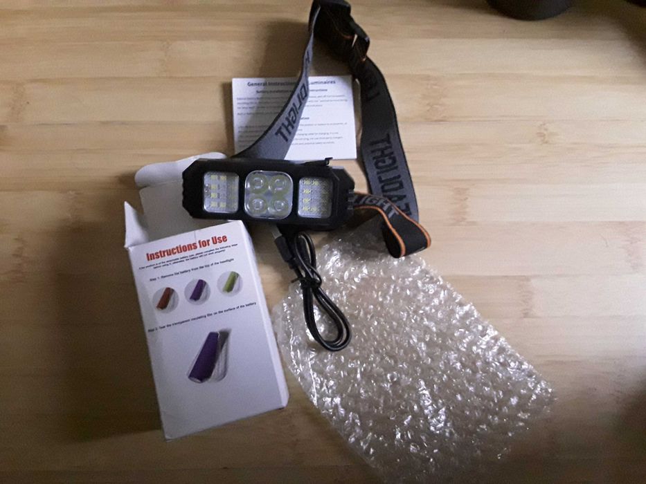 Laterna de cap cu acumulator 18650 NOUA