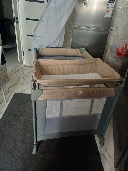 Продаётся фирменный манеж кровать люлька 4в1