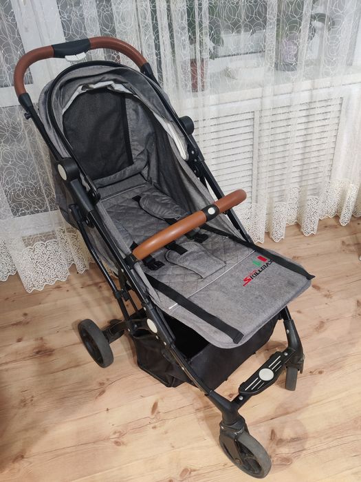 Детская складная коляска