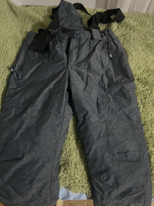 Продам  комбинезон зимний с курткой