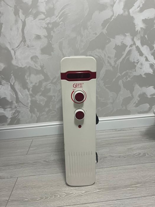 Масляный обогреватель.