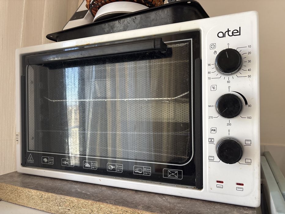 Духовка artel плозо греет