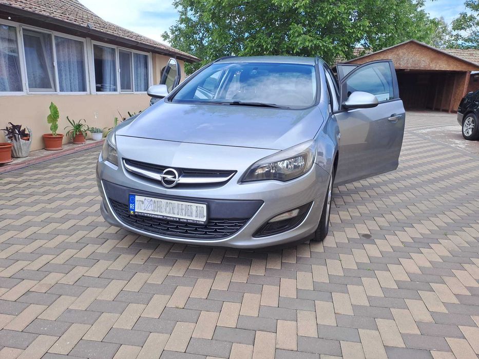 Autoturism Opel Astra J Sport Tourer,1.7 CDTI 110CP/an fabricatie 12/2013/182350 km/Navi/Intretinuta