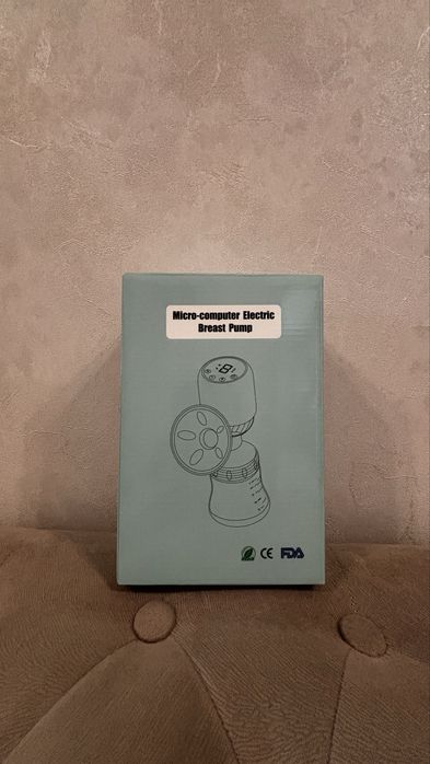 Молокоотсос для кормящих мам