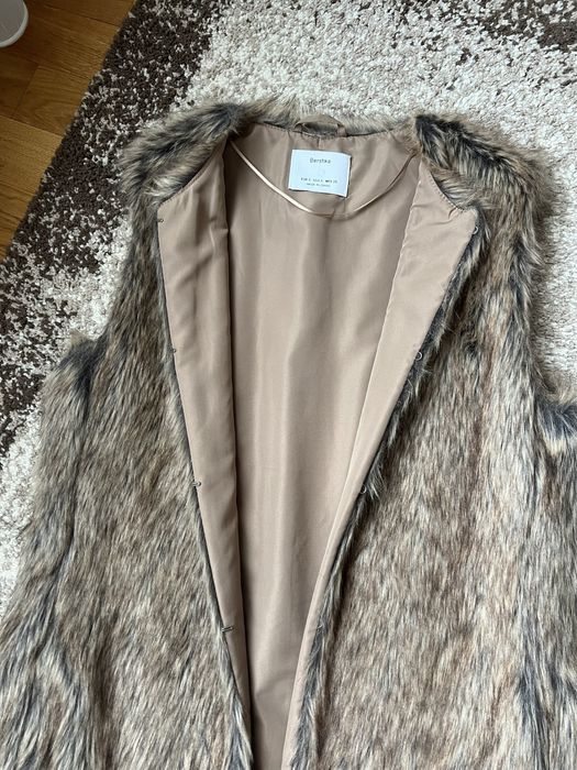 Vesta de blana dama