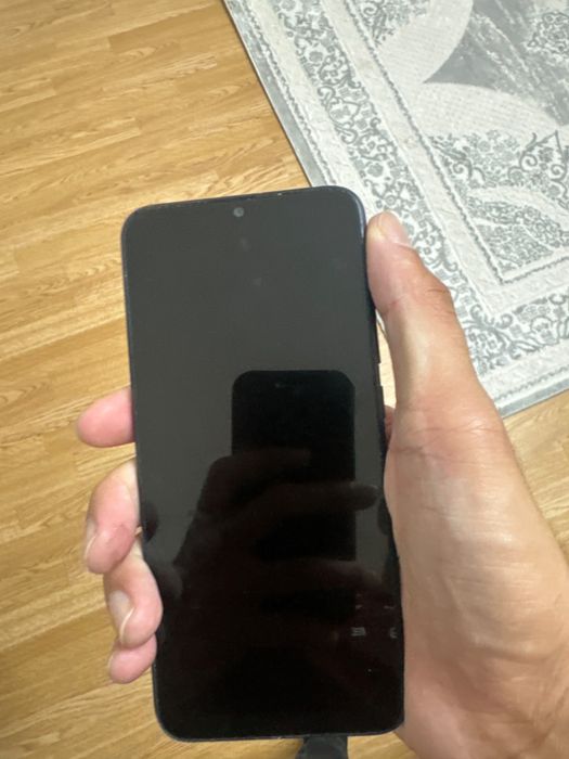 Телефон Redmi.