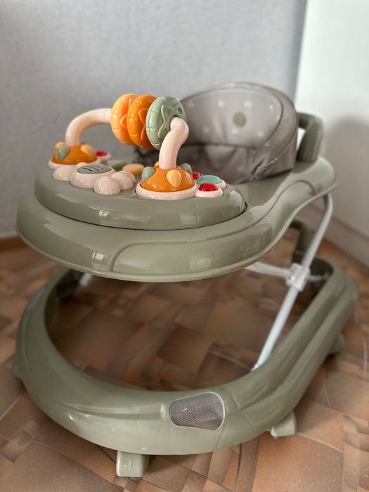 Ходунки детские в оливковом цвете.