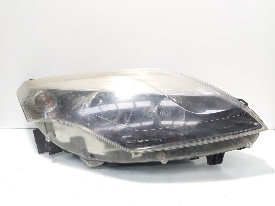 Far dreapta cu lupa si xenon, Renault Laguna 3 Combi, facelift volan pe stanga Piesa originala