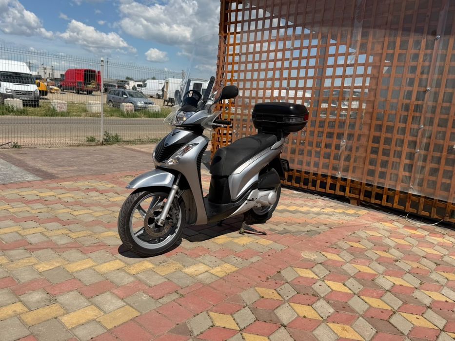 Honda sh 125i 2009 acte Germania se conduce cu categoria B