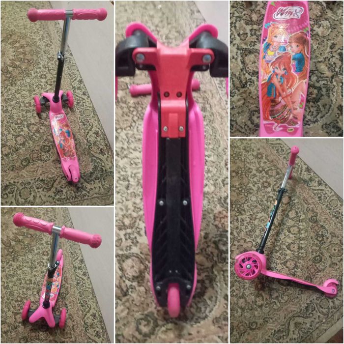 Самокат детский розовый.