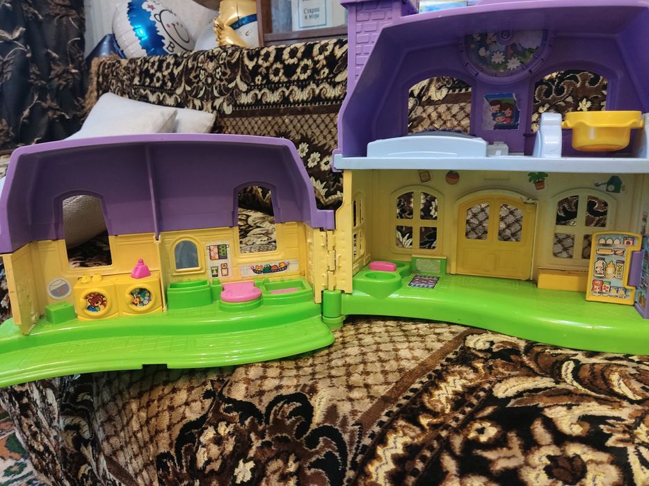 Игрушечный дом для кукол