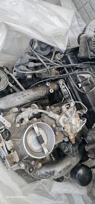 Двигатель м102 w124