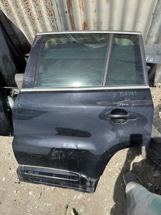 Задна лява врата Vw Tiguan 2008-14год с лека забележка