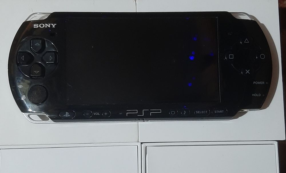 Vand psp în stare bună 3003 cu god of war