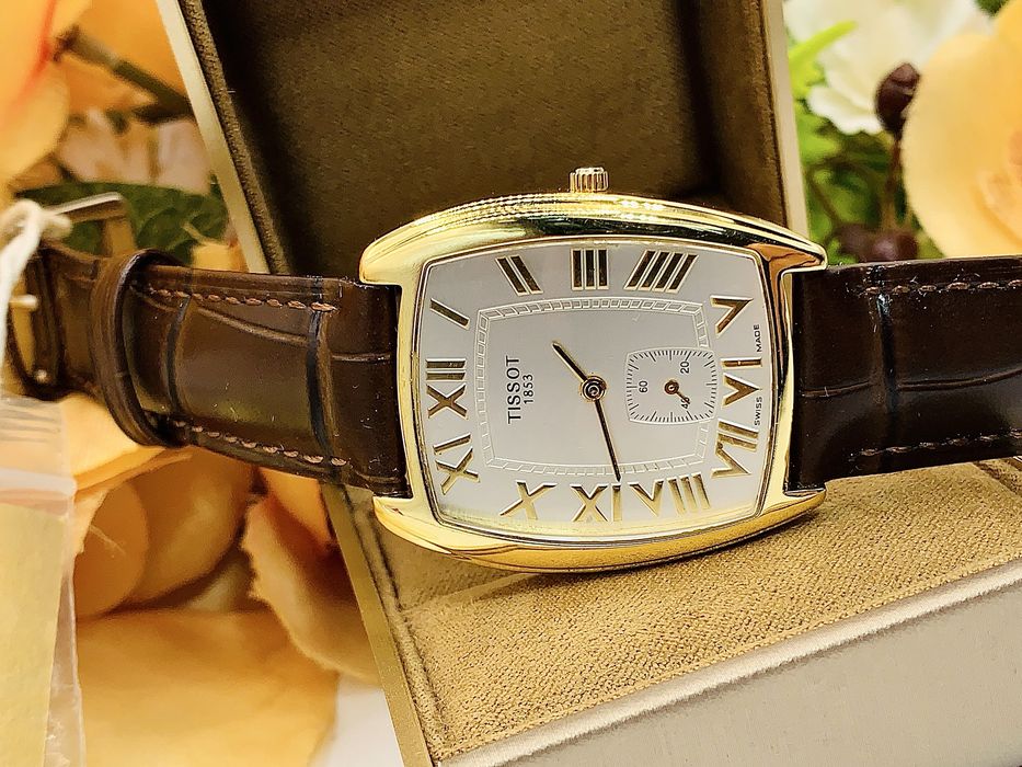 Фирменные Швейцарские заводские золотые часы Tissot