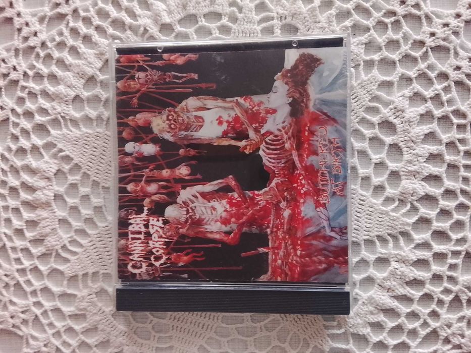 Cannibal Corpse-Butchered at Birth и Tomb of Mutilated