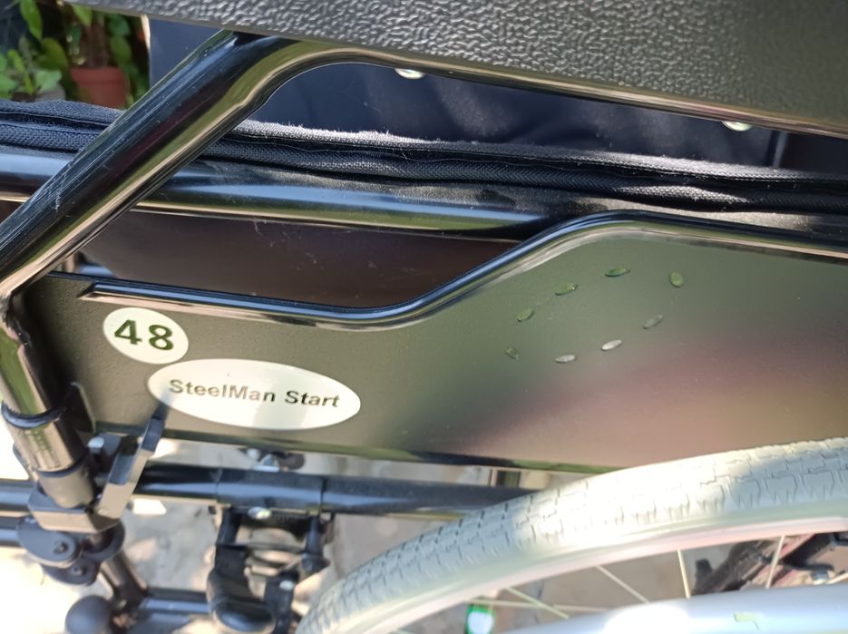 Cărucior cu rotile.