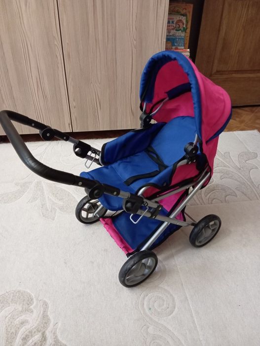 Продам игрушечную коляску.