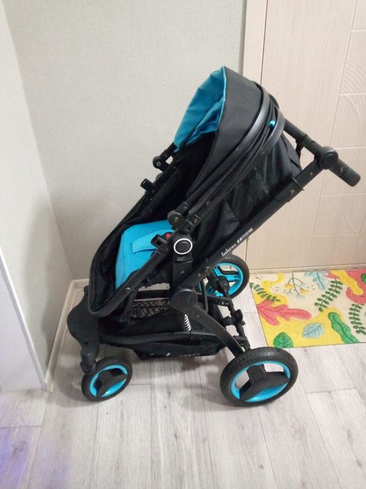 Продам коляску черно берюзовом цвете
