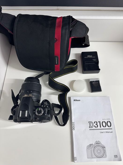 Nikon D3100 cu obiectiv  18–55mm + încărcător + baterie