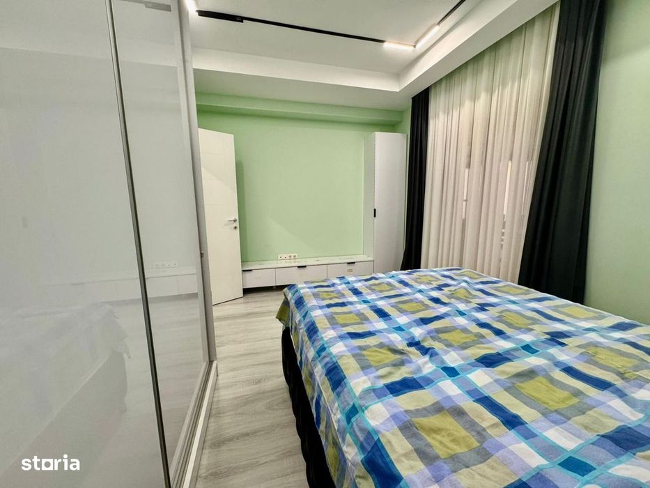 COSMOPOLIS - Apartament cu 3 camere si gradina, mobilat si utilat.