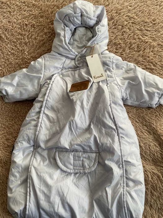 Продам детские комбинезоны .