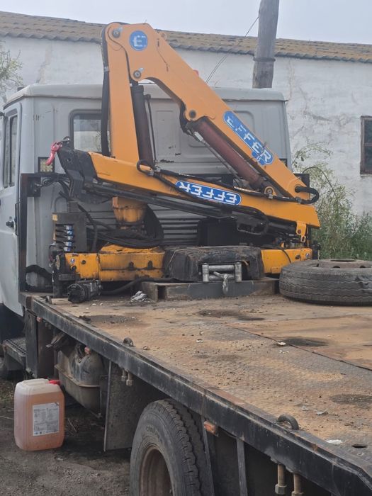 Эвакуатор-манипулятор