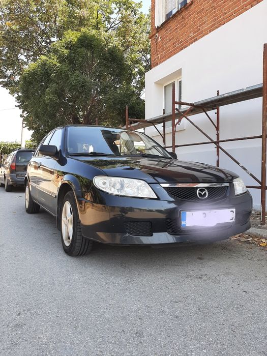 Mazda 323f, бензин 1.3- 72к.с