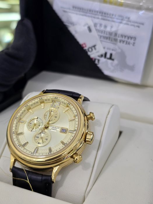 Продам золотые часы Tissot 750 пробы