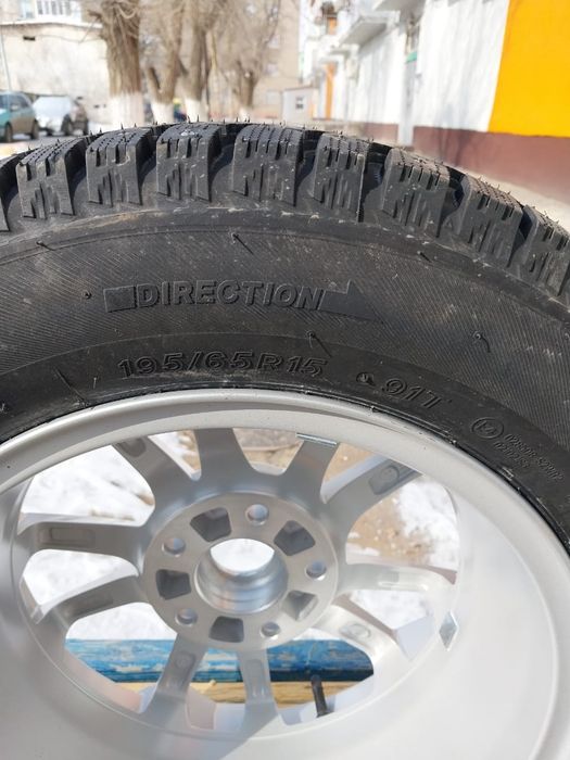 Продам новые шины зимние.Шипованные с дисками