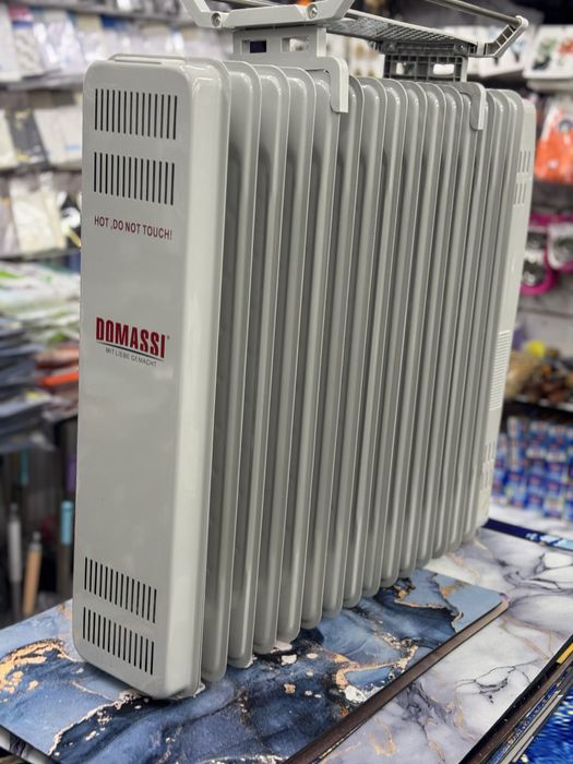 Maslinniy pechka , масляный обогреватель , abogrevatel maslenniy .