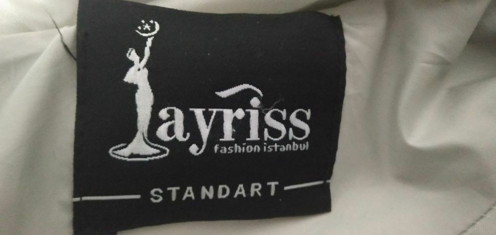 Удлиненный зимний пуховик